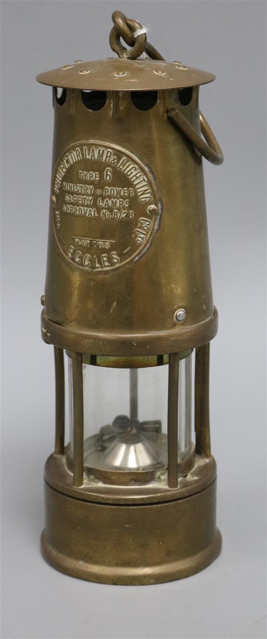 An Eccles protector lamp and lighting miners lamp